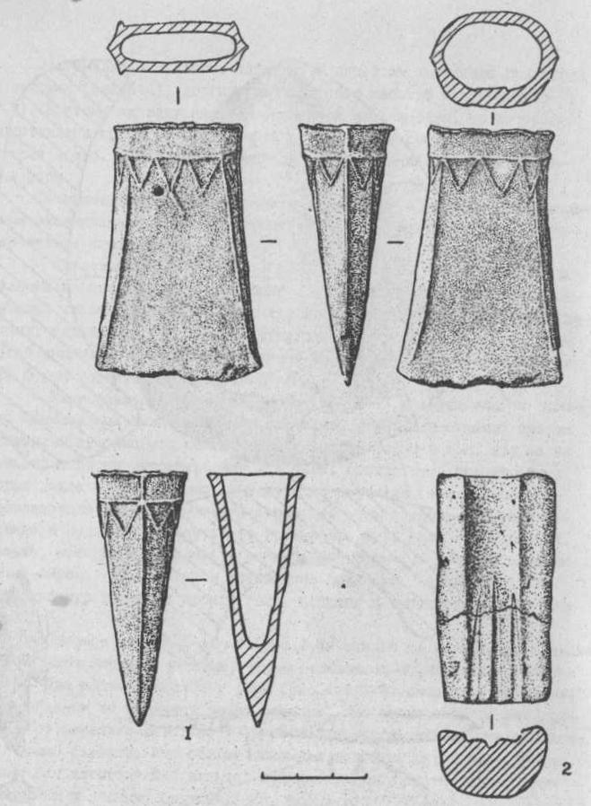 Рис. 2. Бронзовый кельт (1) и литейная форма (2).