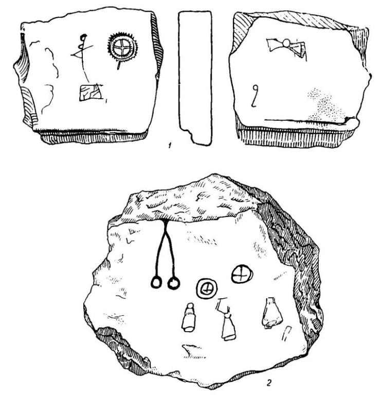 Рис. 56. Каменные плитки с рисунками с городища Камно.