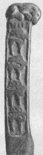 138. Фигурка тигра на рукоятке ножа с рельефным изображением оленей. Минусинская степь.