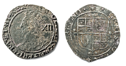 Фото пары серебряных монет 17-го века.
