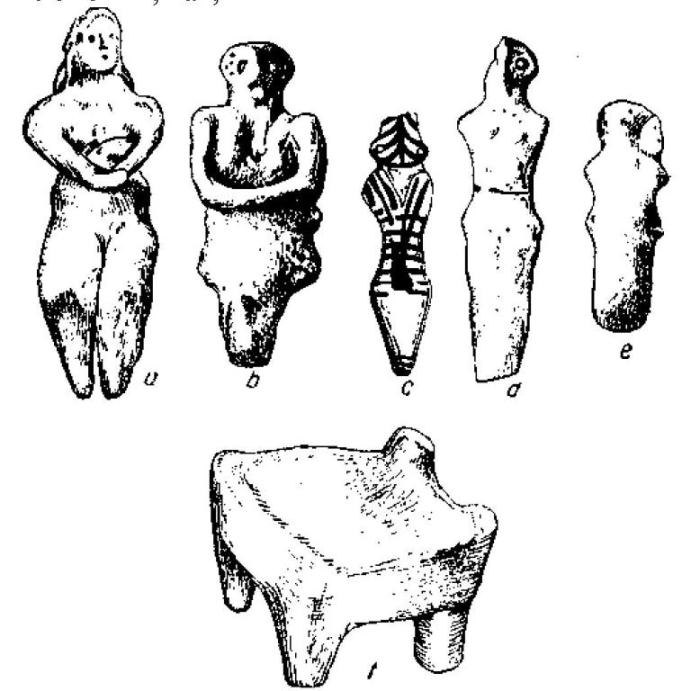 Рис. 73. Трипольские статуэтки и модель трона.